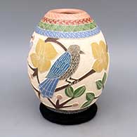 Polychrome jar with sgraffito and painted bird, butterfly, branch, flower, berry, and geometric design
 by Melissa Tena of Mata Ortiz and Casas Grandes