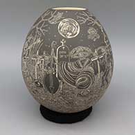 Black and white jar with sgraffito Night of the Dead design
 by Hector Javier Martinez of Mata Ortiz and Casas Grandes