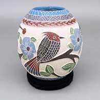 Polychrome jar with a sgraffito and painted bird, branch, flower, leaf, berry, and geometric design
 by Melissa Tena of Mata Ortiz and Casas Grandes
