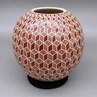 Red and white jar with a sgraffito fish and geometric design
 by Leonel Lopez Sr of Mata Ortiz and Casas Grandes