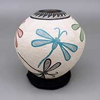 Polychrome jar with a sgraffito and painted dragonfly and geometric design
 by Octavio Silveira of Mata Ortiz and Casas Grandes