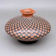Polychrome jar with a rolled, square lip and a cuadrillos geometric design
 by Yoly Ledezma of Mata Ortiz and Casas Grandes