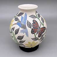 Polychrome jar with a flared opening and a sgraffito-and-painted hummingbird, butterfly, flower, leaf, and branch design
 by Sandra Lorena Arras of Mata Ortiz and Casas Grandes