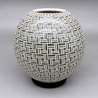 Green and white jar with a sgraffito fish and geometric design
 by Leonel Lopez Sr of Mata Ortiz and Casas Grandes