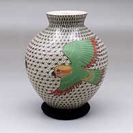 A polychrome jar with a flared rim and a four parrot and geometric design
 by Olga Arras of Mata Ortiz and Casas Grandes