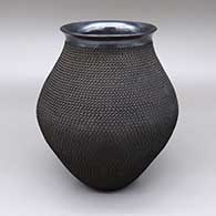 Gunmetal and black jar with a flared opening and textured body
 by Ismael Sandoval of Mata Ortiz and Casas Grandes
