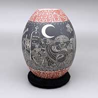 Polychrome jar with a sgraffito Night of the Dead and lace geometric design
 by Hector Javier Martinez of Mata Ortiz and Casas Grandes