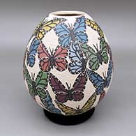 Polychrome jar with a sgraffito-and-painted butterfly design
 by Leticia Ledezma of Mata Ortiz and Casas Grandes