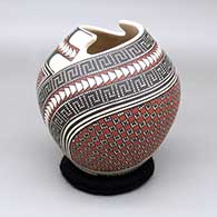 Polychrome jar with an organic cut opening and a painted cuadrillos and geometric design
 by Mirna Hernandez of Mata Ortiz and Casas Grandes