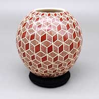 Red jar with a sgraffito geometric design
 by Leonel Lopez Jr of Mata Ortiz and Casas Grandes