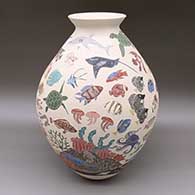 Large polychrome jar with a flared opening and a sgraffito and painted underwater design featuring tropical fish, squid, jellyfish, manta ray, octopus, seahorse, eel, sea turtle, shark, starfish, conch shell, clam, nautilus shell, anemone, and coral reef elements
 by Adrian Corona of Mata Ortiz and Casas Grandes