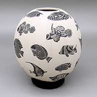Black-on-white jar with a sgraffito assorted tropical fish design
 by Adrian Corona of Mata Ortiz and Casas Grandes