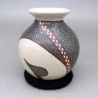 Small polychrome jar with a flared opening and a cuadrillos geometric design
 by Yulissa Tena of Mata Ortiz and Casas Grandes