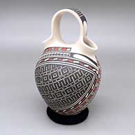 Polychrome wedding vase-style jar with a cuadrillos and geometric design
 by Mirna Hernandez of Mata Ortiz and Casas Grandes