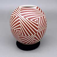 Red-on-white jar with a geometric design
 by Tati Ortiz of Mata Ortiz and Casas Grandes