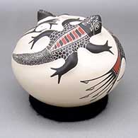 Polychrome jar with an applique, sgraffito, and painted lizard and geometric design
 by Angela Corona of Mata Ortiz and Casas Grandes