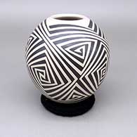 Black-on-white jar with a geometric design
 by Tati Ortiz of Mata Ortiz and Casas Grandes