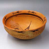 Black-on-orange bowl with bands of corrugation and geometric design outside, geometric design inside
 by Nampeyo of Hano of Hopi
