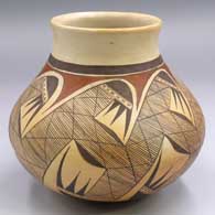 Polychrome rolled lip jar with a migration pattern design
 by Priscilla Namingha of Hopi