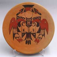 Round polychrome yellowware tile with fire clouds and a thunderbird design
 by Valerie Kahe of Hopi