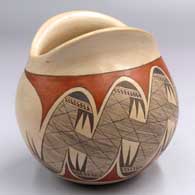Polychrome jar with an organic opening, a lightly carved ear of corn and a panel of migration pattern design
 by Dextra of Hopi