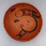 Black and red bowl with dragonfly, tadpole, and geometric design
 by Gwen Setalla of Hopi