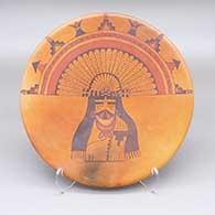 Round polychrome tile with fire clouds and a Pahlik Mana design
 by Valerie Kahe of Hopi