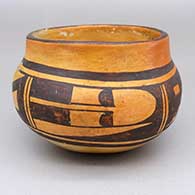 Polychrome bowl with fire clouds and a four panel geometric design
 by Unknown of Hopi
