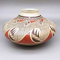 Polychrome jar with fire clouds and a checkerboard and migration pattern geometric design
 by James Nampeyo of Hopi