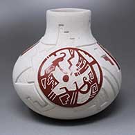 A red-on-buff jar with a raised neck and a sgraffito, carved and painted katsina and geometric design
 by Thomas Polacca of Hopi