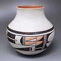 A polychrome white ware jar decorated with a four-panel Payupki geometric design pattern
 by Eunice Navasie of Hopi