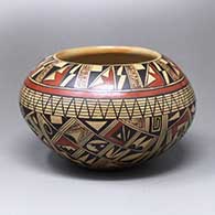 A small polychrome jar decorated with a four-panel shard and geometric design
 by Rondina Huma of Hopi