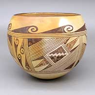 Black-on-red bowl with fire clouds and a geometric design
 by Beth Sakeva of Hopi