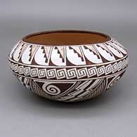 Black and white bowl with a kiva step, fine line, spiral, and geometric design
 by Tyra Naha of Hopi