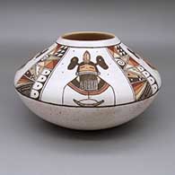 Polychrome jar with a four-panel katsina and geometric design
 by Rainy Naha of Hopi