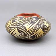 Small polychrome jar with fire clouds and a migration pattern geometric design
 by Rachel Sahmie of Hopi