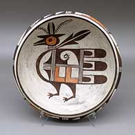 Polychrome bowl with a bird design on inside and a kiva step and geometric design on outside
 by Sadie Adams of Hopi