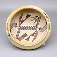 Polychrome bowl with fire clouds and a checkerboard and geometric design on inside and outside
 by Rachel Sahmie of Hopi
