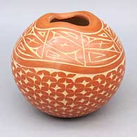 Red jar with organic opening and sgraffito geometric design
 by Carol Vigil of Jemez