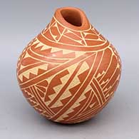Red jar with organic opening and sgraffito geometric design
 by Carol Vigil of Jemez