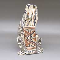 Polychrome owl storyteller with seven chicks and avanyu design
 by Loren Wallowing Bull of Jemez
