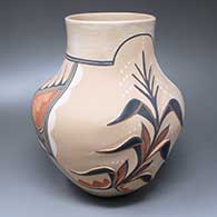 A polychrome jar decorated with a two-panel geometric design and a sculpted corn plant
 by Virginia Ponca Fragua of Jemez