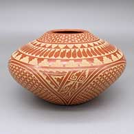 Red jar with a sgraffito kiva step, feather ring, and geometric design
 by Wilma Baca Tosa of Jemez