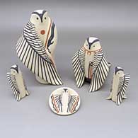 Five-piece polychrome owl nativity set with painted avanyu details
 by Loren Wallowing Bull of Jemez