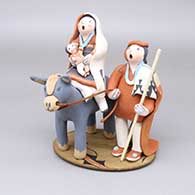 Polychrome Flight to Egypt figure with a leather rein and a wood walking stick and cane
 by Mary Lucero of Jemez