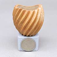 Miniature micaceous gold spiral melon jar with an organic opening
 by Dominique Toya of Jemez