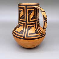 Black-on-marbleized clay jar with a handle and a kiva step and geometric design
 by Calvin Analla Jr of Laguna