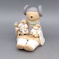 Polychrome storyteller with three children and polar bear
 by Stella Teller of Isleta