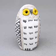Small polychrome owl figure with yellow eyes and a geometric design
 by Kimo DeCora of Isleta