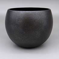 Micaceous black bowl
 by Robert Vigil of Nambe